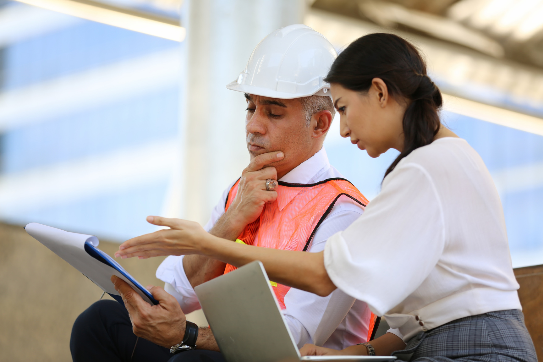 Engineer and Business Manager Visiting Construction Site
